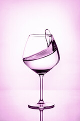 glass with a rosy background