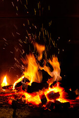 Fototapeta na wymiar detailed close-up of wooden planks burning in a bonfire