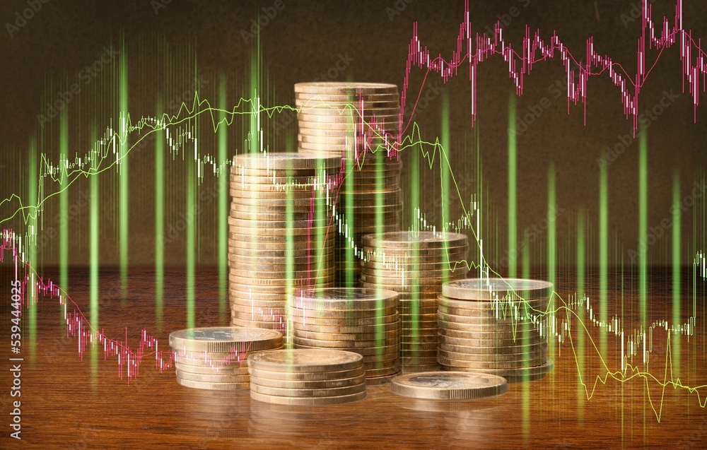 Poster stack of coins with graph or chart on the desk