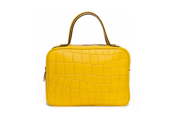 Front view of yellow handmade leather female bag with top handle for women isolated on white...