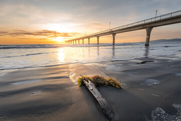 Beautiful sunrise at New Brighton Pier, Christchurch, New Zealand. It is one of eastern country's...