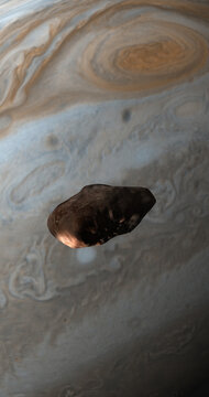 Natural satellite Amalthea orbiting around Jupiter planet