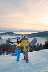 couple snowboarder ans skier portrait