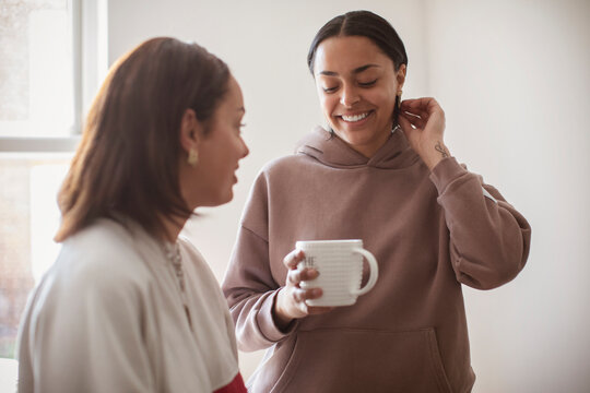 Young Women Friends Drinking Tea