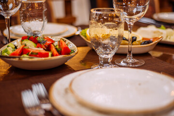 Beautiful table setting. Reserved table in the restaurant.