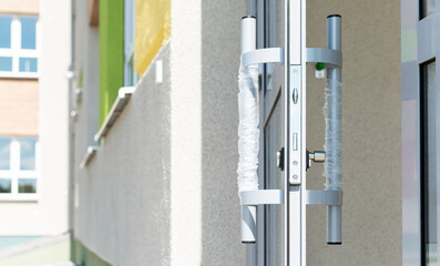 Aluminum door with handles in a newly built house