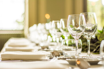 table settings with wine glasses