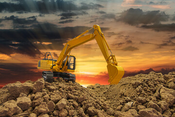 Crawler Excavator is digging  in the construction site  on sunbeam  background.