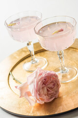 champagne cocktails at wedding on brass plate