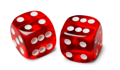 Red dices in midair on white background close up