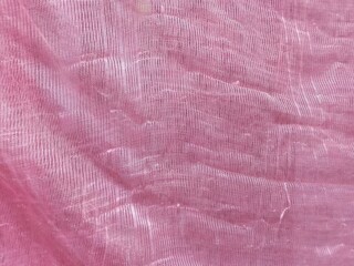 pink mosquito net fabric surface texture. net fabric background
