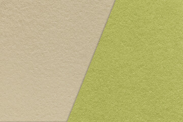 Texture of craft light beige and green paper background, half two colors. Vintage kraft olive cardboard.