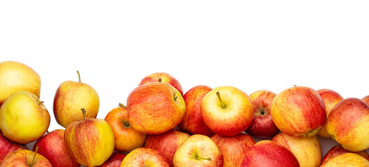 a heap of apples as banner, border, headline, header or panorama, isolated with white background