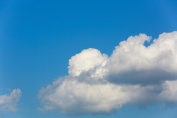 Naklejka na ściany i meble Blue sky with white clouds beautiful background.