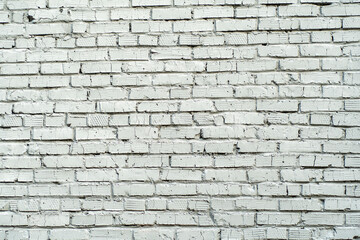 Wall of white bricks. Background with wall painted with white paint.