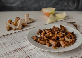 Fried mushrooms. grilled mushrooms on a plate.
