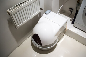 Automatic toilet for cats. Pet gadgets