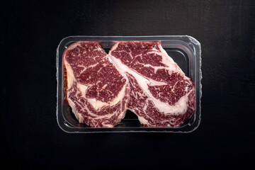Beef steak in vacuum packaging. Template for meat packaging - obrazy, fototapety, plakaty