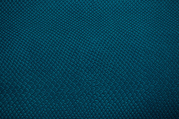 Beautiful bright eco-leather, animal skin texture in blue color, close-up as a background.