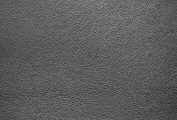 Fototapeta na wymiar Beautiful bright eco-leather, animal skin texture in gray color, close-up as a background.