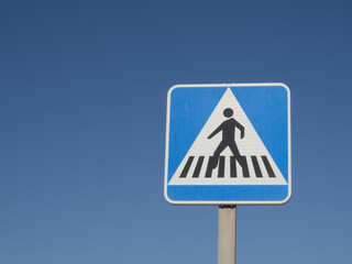 Pedestrian traffic signal with blue sky copy space