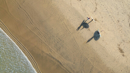 surfers on Cornish beach