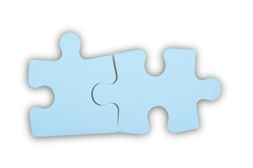 Blue puzzle pieces on grey background
