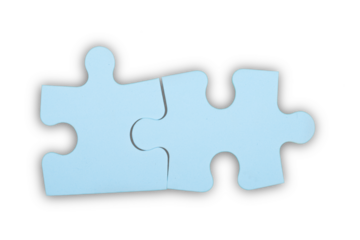 Blue puzzle pieces on grey background