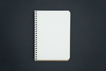 Notebook blank isolated on black background.