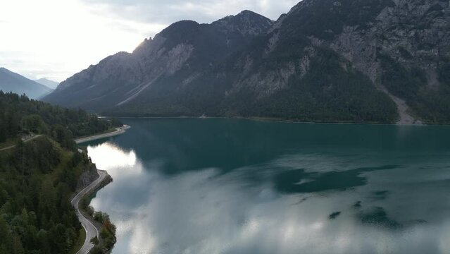 Lake in Tyrol Austria morning rising drone view