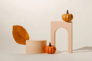 Foto op Canvas Podium with autumn leaf and pumpkins decoration with shadows. Showcase for product presentation © Natureveryday