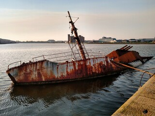 Shipwreck of an old boat on the beach