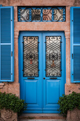 Fototapeta na wymiar Classic facade with blue vintage door