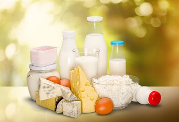 Fototapeta na wymiar Tasty fresh dairy products and milk on the desk