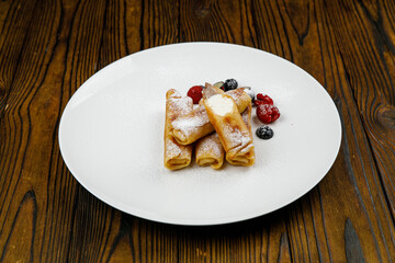 delicious sweet pancakes on a plate.
