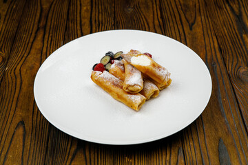 delicious sweet pancakes on a plate.
