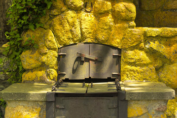 a yellow stone outside oven new england