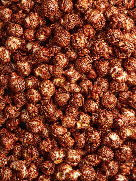 Chocolate flavored caramelized popcorn background