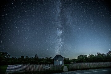 Beautiful starry sky over the Frosty Drew Observatory and Science Center in Rhode Island.