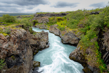 Barnafoss, a beautiful and fast-flowing waterfall in west Iceland 