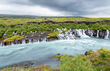 Hraunfossar, or "Lava Falls", is a series of small waterfalls located in west Iceland