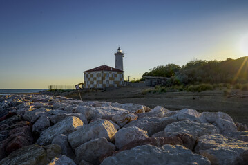 Fototapeta na wymiar Bibione lighthouse in the province of Venice