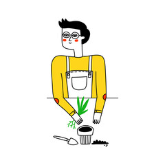 Man gardener planting a flower in a pot. Gardening concept.