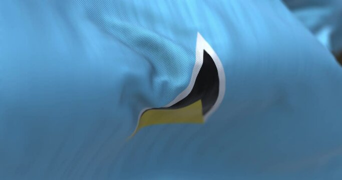 Close-up view of Saint Lucia national flag waving in the wind