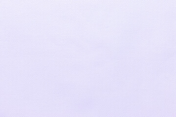 Texture of natural purple color twill fabric close-up. the background for your mockup