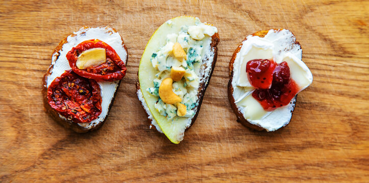 Bruschetti with cheese on a plate. Selective focus.