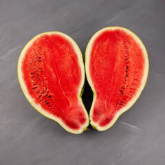 Two Half of pear-shaped watermelon. Deformed ugly watermelon. Concept - Food waste reduction....