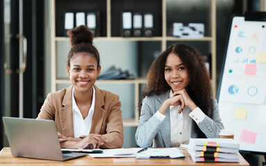 Woman using a laptop at a office