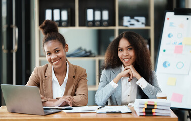 Woman using a laptop at a office