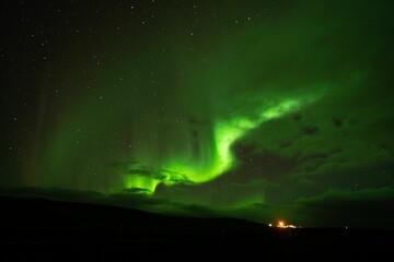 Beautiful, green northern lights in the vast sky